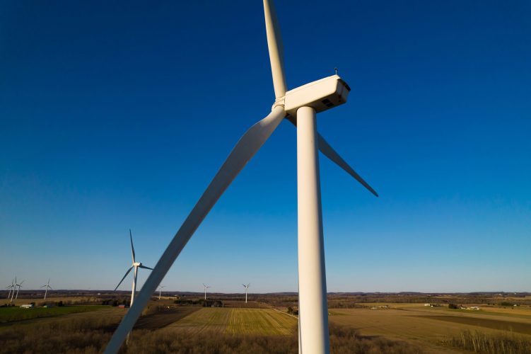 Close,Up,Shot,Of,Wind,Mills,Turbine,Rotating,By,The